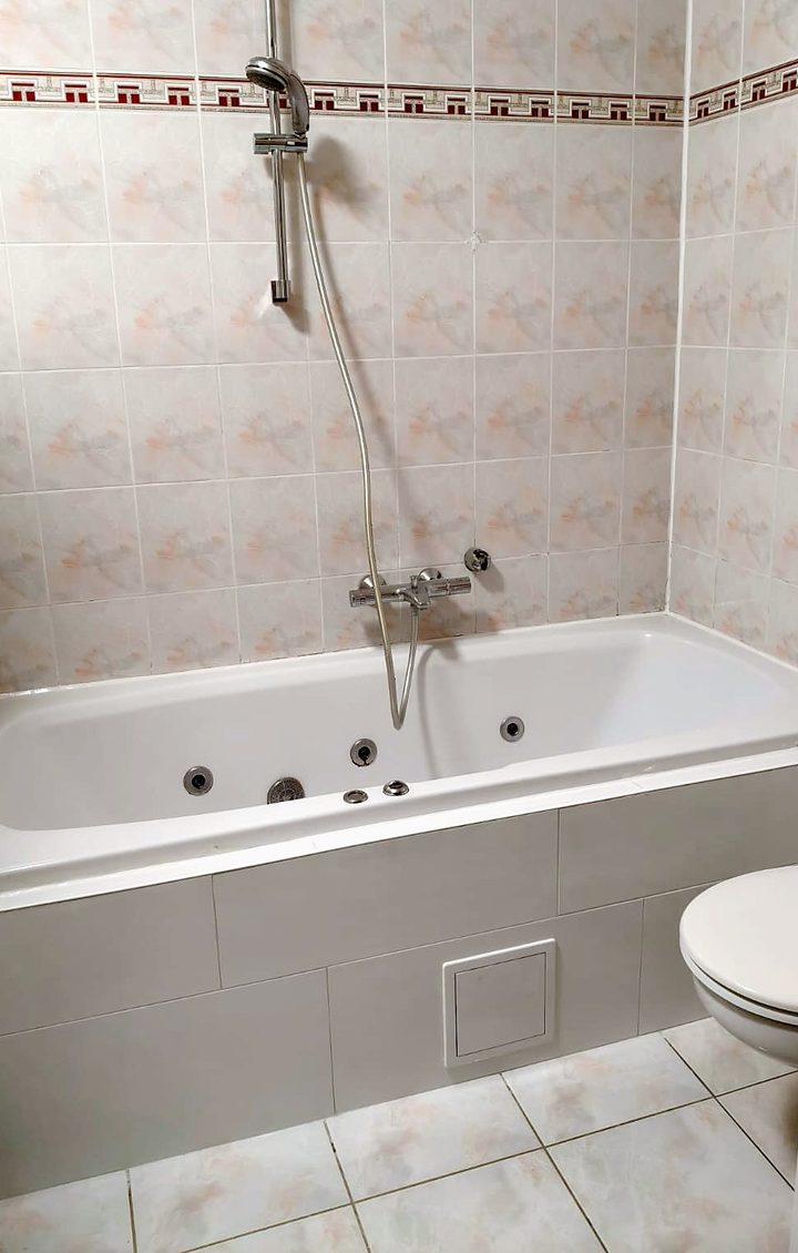 Renovated bathroom with new bathtub